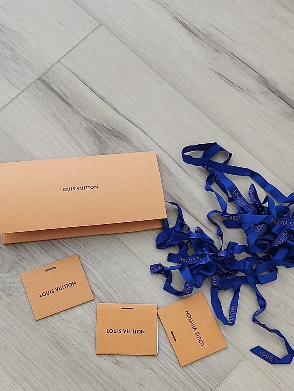Louis Vuitton Blue Ribbon with Orange Gift Tags